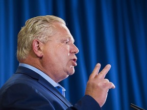 Ontario PC Leader Doug Ford makes a campaign stop at the Royal Canadian Legion in Pickering Ont., on Tuesday, May 22, 2018. THE CANADIAN PRESS/Nathan Denette