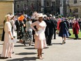 US TV talk host Oprah Winfrey (C) leaves after attending the wedding ceremony of Britain's Prince Harry, Duke of Sussex and US actress Meghan Markle at St George's Chapel, Windsor Castle, in Windsor, on May 19, 2018.