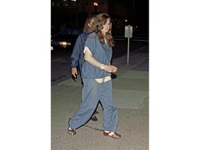 FILE - In this Sept. 8, 1995 file photo, Rachelle "Shelley" Shannon arrives for sentencing in Federal Court in downtown Portland, Ore. Shannon, an anti-abortion activist who shot and wounded a Kansas abortion provider and firebombed clinics in Oregon and elsewhere, has been released from prison to a halfway house to finish her sentence, the Federal Correctional Institution in Waseca, Minn., confirmed Tuesday, May 22, 2018.