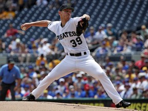 Pittsburgh Pirates starting pitcher Chad Kuhl delivers in the first inning of a baseball game against the Chicago Cubs in Pittsburgh, Monday, May 28, 2018.