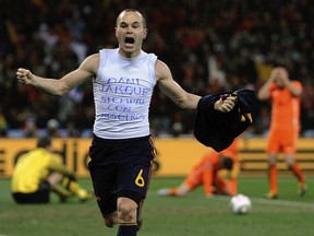 FILE - In this July 11, 2010 file photo, Spain's Andres Iniesta celebrates after scoring the only goal in the World Cup final soccer match against the Netherlands at Soccer City in Johannesburg, South Africa. The 21st World Cup begins on Thursday, June 14, 2018, when host Russia takes on Saudi Arabia.