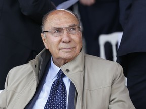 FILE - In this Monday, July 14, 2014 file picture, Serge Dassault, Chairman and CEO of Dassault Group, attends the traditional Bastille Day parade in Paris. French business executive Serge Dassault, a top aviation and arms industrialist, has died in his Paris office. He was 93.