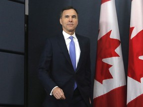 Finance Minister Bill Morneau arrives at a press conference to speak about the Trans Mountain Expansion project in Ottawa on Wednesday, May 16, 2018.