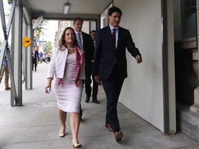 Prime Minister Justin Trudeau and Foreign Affairs Minister Chrystia Freeland arrive at a press conference in Ottawa on Thursday, May 31, 2018. Canada is imposing dollar-for-dollar tariff "countermeasures" on up to $16.6 billion worth of U.S. imports in response to the American decision to make good on its threat of similar tariffs against Canadian-made steel and aluminum.THE CANADIAN PRESS/ Patrick Doyle