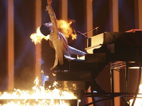 Melovin from Ukraine performs the song 'Under The Ladder' in Lisbon, Portugal, Friday, May 11, 2018 during a dress rehearsal for the Eurovision Song Contest. The Eurovision Song Contest grand final takes place in Lisbon on Saturday May 12, 2018.