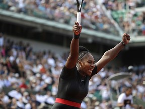 Serena Williams of the U.S. celebrates winning her first round match of the French Open tennis tournament against Krystina Pliskova of the Czech Republic at the Roland Garros stadium in Paris, France, Tuesday, May 29, 2018.