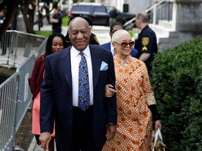 Bill Cosby arrives with his wife, Camille, on April 24, 2018, for his sexual assault trial at the Montgomery County Courthouse in Norristown, Pa.