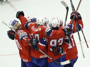 Norway's Thomas Valkvae Olsen,2nd right celebrates with teammates after scoring his sides second goal during the Ice Hockey World Championships group B match between South Korea and Norway at the Jyske Bank Boxen arena in Herning, Denmark, Monday, May 14, 2018.