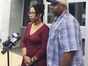 Princess Blanding, the sister of Marcus-David Peters, who was fatally shot by Richmond police and Jeffrey Peters, the uncle of Marcus-David Peters, speak to the media outside Richmond police headquarters in Richmond, Va., Wednesday May 23, 2018. The two viewed police body-camera footage of the incident.