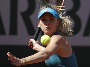 Ukraine's Elina Svitolina returns the ball to Australia's Ajla Tomljanovic during their first round match of the French Open tennis tournament at the Roland Garros Stadium, Sunday, May 27, 2018 in Paris.