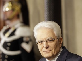 In this photo taken on Thursday, April 5, 2018, Italian President Sergio Mattarella addresses journalists at the Quirinale Presidential Palace at the end of the second day of political consultations, in Rome. Italy's president, who is wielding key power in a political crisis, was a professor thrust into public life when the Mafia slayed his brother. Officially guarantor of the Italian constitution, President Sergio Mattarella has shown how the head-of-stae role has evolved to embrace protecting Italy's place in Europe.