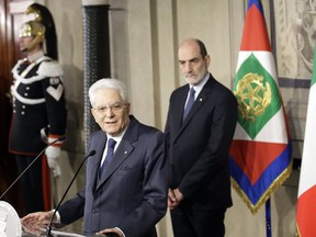In this photo taken on Thursday, April 5, 2018, Italian President Sergio Mattarella addresses journalists at the Quirinale Presidential Palace at the end of the second day of political consultations, in Rome. Italy's president, who is wielding key power in a political crisis, was a professor thrust into public life when the Mafia slayed his brother. Officially guarantor of the Italian constitution, President Sergio Mattarella has shown how the head-of-stae role has evolved to embrace protecting Italy's place in Europe.