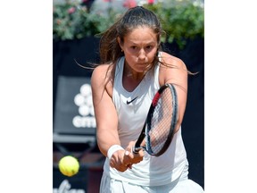 Daria Kasatkina, of Russia, returns the ball to Elina Svitolina, of Ukraine, at the Italian Open tennis tournament in Rome, Thursday, May 17, 2018.