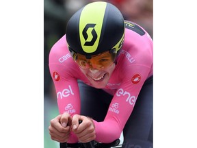 Britain's Simon Yates competes during the 16th stage of the Giro d'Italia cycling race, from from Trento to Rovereto, Italy, Tuesday, May 22, 2018. Yates is still in control of the Giro d'Italia after the British rider limited his losses to closest rival Tom Dumoulin in the individual time trial on Tuesday.