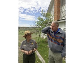 U.S. Interior Secretary Ryan Zinke, right, speaks with Theodore Roosevelt National Park Superintendent Wendy Ross during a visit to the park in western North Dakota on Tuesday, May 22, 2018. Zinke reiterated his support for addressing a maintenance backlog at national parks during a visit to the one named for the U.S. president known for being a champion of conservation.