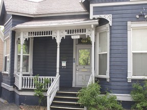 This May 15, 2018 photo shows one of the historic homes in a neighborhood dating to the late 19th century on the edge of the University of Reno campus in Reno, Nev. The historic preservation group, Preserve Nevada, has listed the UNR Gateway District as the most endangered historic place in the state.