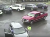 A suspect is seen hitting a car with a sledgehammer in a Philadelphia parking lot.