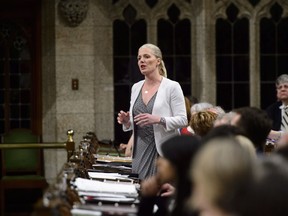 Environment and Climate Change Minister Catherine McKenna stands during question period in the House of Commons on Parliament Hill in Ottawa on Thursday, May 10, 2018.