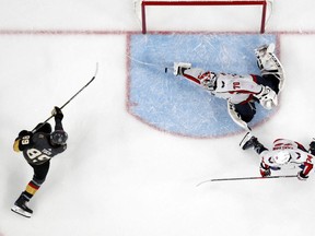 Washington Capitals goaltender Braden Holtby makes a game-saving stick save on shot by Vegas Golden Knights right wing Alex Tuch during the third period of Game 2 of the Stanley Cup final.
