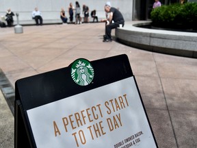 Starbucks is adopting an open bathroom policy, dropping a requirement for customers to buy before they use the facilities, following the arrest of two black men that turned into a public relations nightmare for the coffee chain.