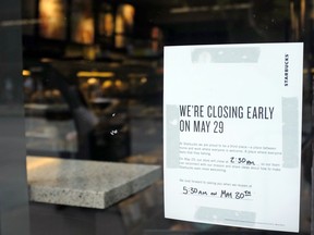 A store closing sign for May 25 is posted outside of a Starbucks store, Friday, May 25, 2018, in Chicago. Starbucks will close more than 8,000 stores nationwide on Tuesday to conduct anti-bias training, the next of many steps the company is taking to try to restore its tarnished diversity-friendly image.