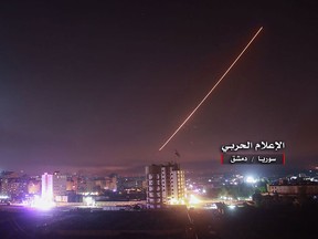 An image released on May 10, 2018, by the government-affiliated "Central War Media" in Syria purportedly shows Syrian air defence systems intercepting Israeli missiles over Damascus' airspace.