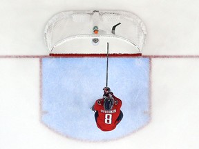 Washington Capitals forward Alex Ovechkin breaks his stick over the net after the Tampa Bay Lightning scored an empty-net goal in Game 4 on May 17.