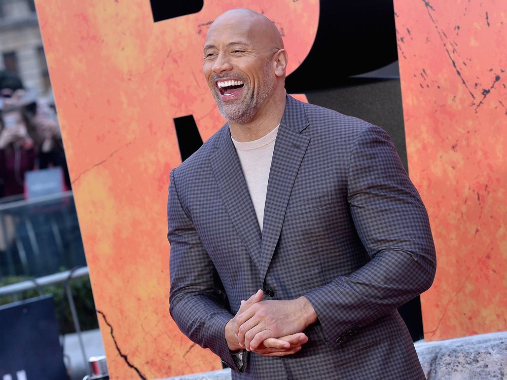 How much does The Rock charge to post about his movies on Instagram