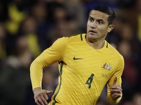 FILE - In this March 27, 2018, file photo, Australia's Tim Cahill plays during a friendly soccer match between Colombia and Australia in London. Tim Cahill has been included in Australia's provisional squad for this year's World Cup in Russia, boosting his prospects of being selected for a fourth World Cup.