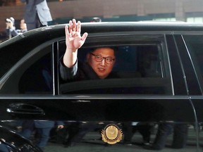 FILE - In this April 27, 2018 file photo, North Korean leader Kim Jong Un waves from a car as he returns to North Korea after the meeting with South Korean President Moon Jae-in at the border village of Panmunjom in the Demilitarized Zone, South Korea. Unlike his dictator father, who famously shunned air travel, North Korean leader Kim Jong Un jetted off to the northeastern Chinese city of Dalian, becoming the first North Korean ruler to travel abroad in that manner in 32 years. (Korea Summit Press Pool via AP, File)