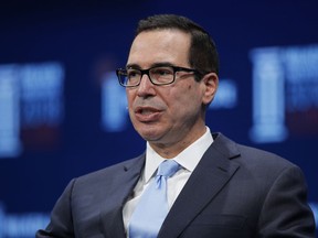 In this April 30, 2018 photo, Treasury Secretary Steven Mnuchin speaks during a discussion at the Milken Institute Global Conference, in Beverly Hills, Calif.