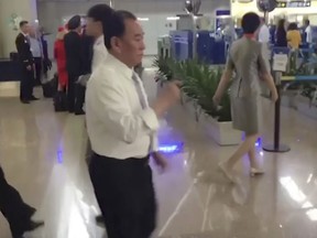 In this image made from video, Kim Yong Chol, a former military intelligence chief who is now Kim Jong Un's top official on inter-Korean relations, walks through Beijing airport after his arrival Tuesday, May 29, 2018. He was at North Korean leader Kim Jong Un's side at the table in last weekend's North-South summit, and had been a prominent senior official in other important talks. It was not possible to confirm the reason for his visit to Beijing, or if he would be traveling on to another destination. (AP Photo)