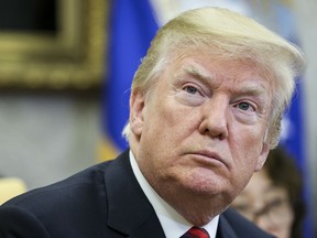 U.S. President Donald Trump listens during a meeting with Moon Jae-in, South Korea's president, not pictured, in the Oval Office of the White House in Washington, D.C., U.S., on Tuesday, May 22, 2018.