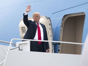 U.S. President Donald Trump boards Air Force One at Joint Base Andrews, Maryland, U.S., on Thursday, May 31, 2018. The Trump administration is imposing tariffs on steel and aluminum imported from the European Union, Canada and Mexico to help protect America's manufacturing base, Commerce Secretary Wilbur Ross said today.