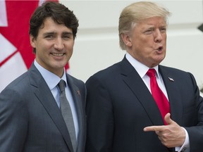 US President Donald Trump (R) welcomes Canadian Prime Minister Justin Trudeau at the White House in Washington, DC. Canadian Prime Minister Justin Trudeau and US President Donald Trump spoke May 14, 2018 about the possibility of bringing ongoing negotiations to revamp the North American Free Trade Agreement to a "prompt conclusion," the Canadian leader's office said.The pair also discussed the upcoming Group of Seven (G7) summit in Canada, Trudeau's office said in a statement.