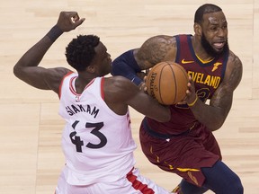 Pascal Siakam tries to guard LeBron James during Game 2 at Air Canada Centre. James played 41 minutes, scoring 43 points with 14 assists and eight rebounds in the 128-110 victory.