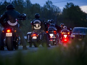 Club members and associates leave the Hells Angels club house during a party on the May long weekend in Niagara Falls, Ontario, May 20, 2017.