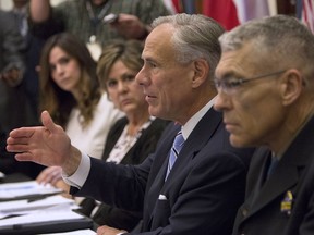 Gov. Gregg Abbott hosts a roundtable discussion about safety in Texas schools after the recent school shooting in Sante Fe at the Texas state Capitol on May 22, 2018, in Austin, Texas. Abbott convened the first in a series of discussions on school safety Tuesday.