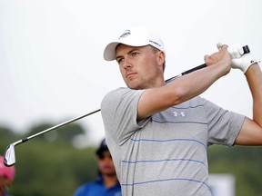 Jordan Spieth watches his ball after hitting from the fairway on the first hole during the pro-am at the AT&T Byron Nelson golf tournament at Trinity Forest Golf Club in Dallas, Wednesday, May 16, 2018.