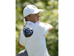 Jordan Spieth watches his shot from the ninth tee during the first round of the Byron Nelson golf tournament at Trinity Forest in Dallas on Thursday, May 17, 2018.