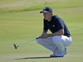 Jordan Spieth lines up a putt on the 18th green during the second round of the AT&T Byron Nelson golf tournament in Dallas, Friday, May 18, 2018.