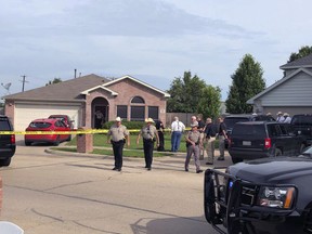 Denton County Sheriff Deputies work the scene of a shooting in Ponder, Texas where multiple people died Wednesday, May 16, according to Capt. Orlando Hinojosa, a spokesman for the Denton County Sheriff's Office.