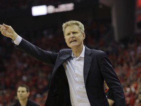 Golden State Warriors head coach Steve Kerr argues a call during the second half in Game 7 of the NBA basketball Western Conference finals against the Houston Rockets, Monday, May 28, 2018, in Houston.