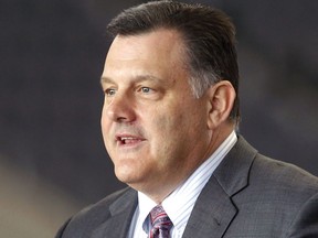 FILE - In this Feb. 26, 2014, file photo, USA Gymnastics president Steve Penny speaks during a news conference in Arlington, Texas. Former USA Gymnastics President Steve Penny is scheduled to appear before a Senate subcommittee on Tuesday, June 5, 2018 to face questioning about the sex-abuse scandal involving former team doctor Larry Nassar.