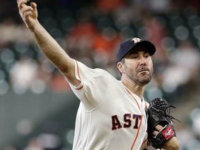 Houston Astros starting pitcher Justin Verlander (35) throws against the San Francisco Giants during the first inning of a baseball game Wednesday, May 23, 2018, in Houston.