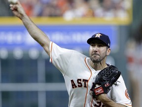 Houston Astros' starting pitcher Justin Verlander (35) throws against the New York Yankees during the first inning of a baseball game Tuesday, May 1, 2018, in Houston.