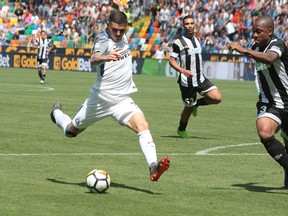 Inter's Mauro Icardi scores his side's third goal during the Italian Serie A soccer match between Udinese and Inter Milan at the Friuli stadium in Udine, Italy, Sunday May 6, 2018.