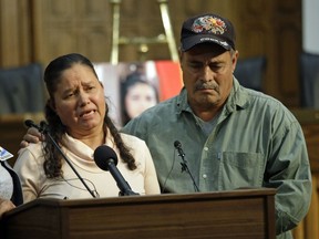 FILE - In this April 30, 2015, file photo, shows missing student Elizabeth Elena Laguna Salgado's parents Libertad Edith Salgado and Julio Cesar Laguna speaking during a news conference in Provo, Utah, after traveling from their home in Chiapas, Mexico.  According to the Deseret News, investigators confirmed Wednesday, May 23, 2018 that they have found the remains of Salgado who had been missing for more than three years.