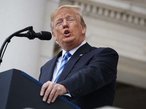 President Donald Trump speaks during a Memorial Day ceremony at Arlington National Cemetery, Monday, May 28, 2018, in Arlington, Va.