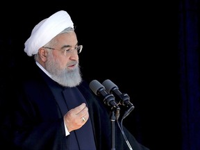 In this photo released by an official website of the office of the Iranian Presidency, President Hassan Rouhani speaks in the northeastern city of Sabzevar, on his tour of Razavi Khorasan province, Sunday, May 6, 2018. Iran's president is warning President Donald Trump that pulling America out of the nuclear deal with world powers would be a "historic regret." (Iranian Presidency Office via AP)